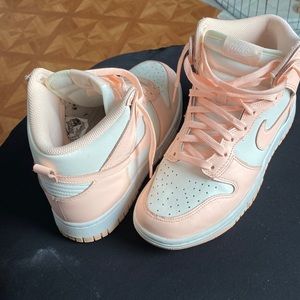 I am selling Women High top Nike dunks Crimson tint
